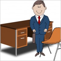 Teacher / Manager between chair and desk
