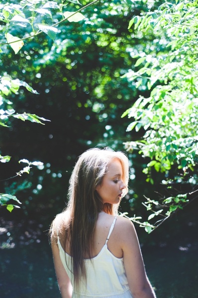 adult backlit daytime dress enjoyment forest girl
