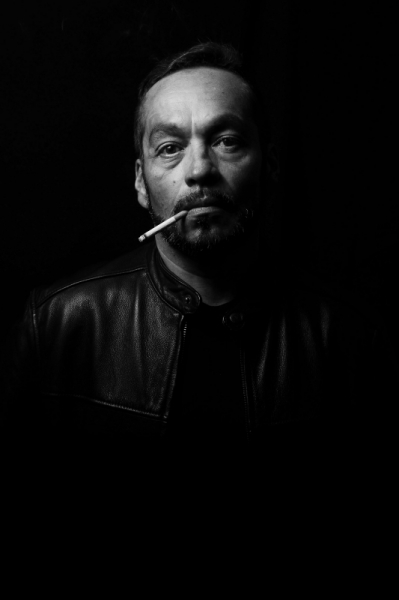 black white picture of smoking man