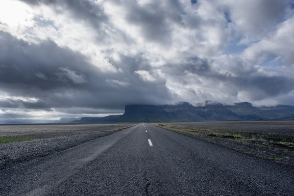 asphalt cloud desert desolate distance empty highway