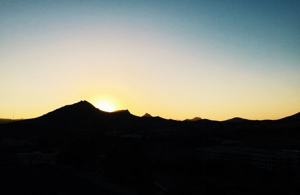 backlit dawn desert dusk evening hill landscape