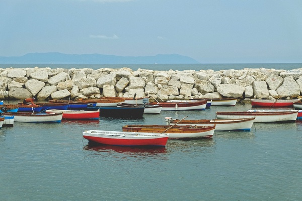 bay beach boat coast coastline destination fisherman