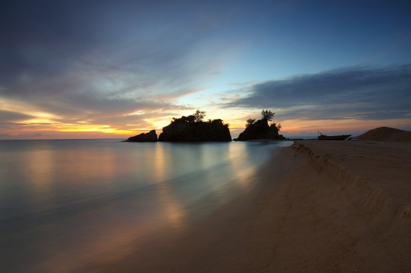 empty calm beach at sunrise
