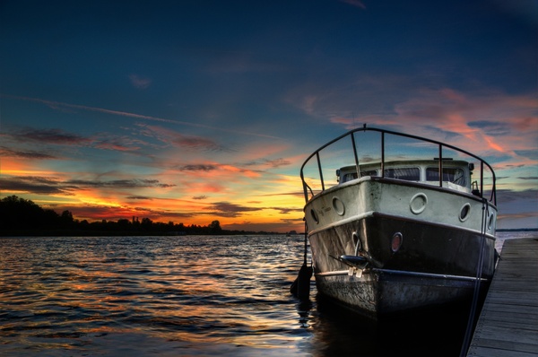 boat at sunset in hdr