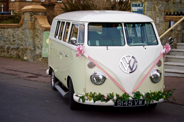 classical car decorated with ribbon and flowers