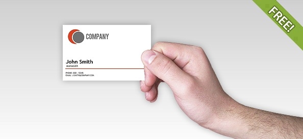 Business card in a man’s hand