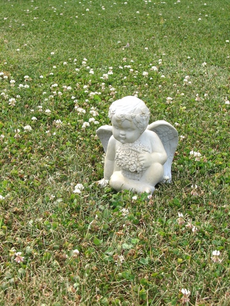 cherub with flowers