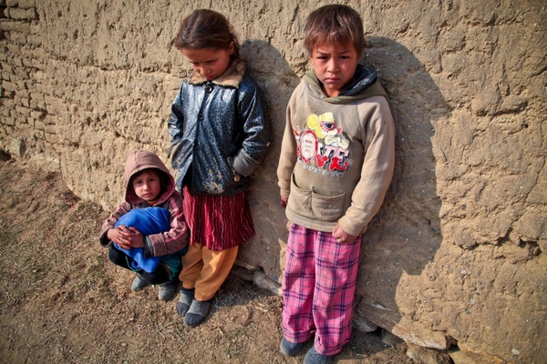 children poor mud village