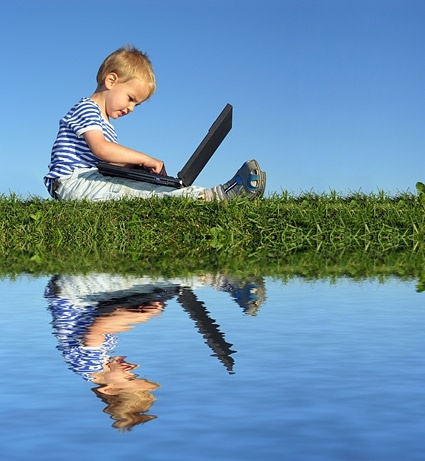 children with a laptop stock photo
