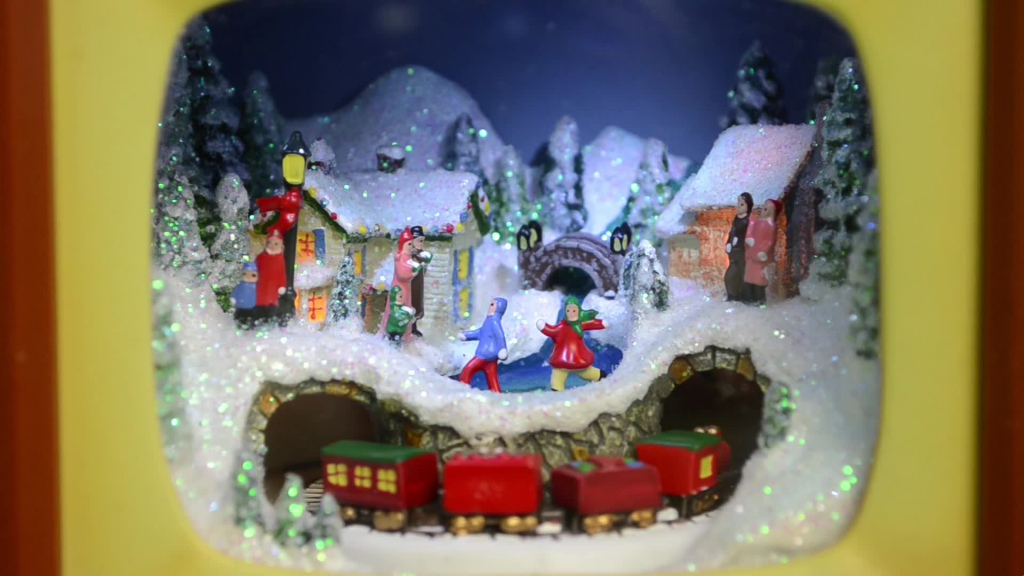 christmas decoration with train model moving in tunnel