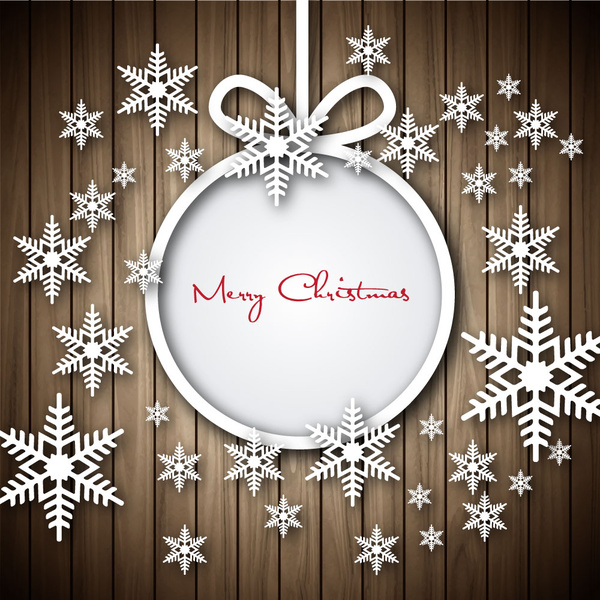 christmas greeting with snowflakes and wooden plank background