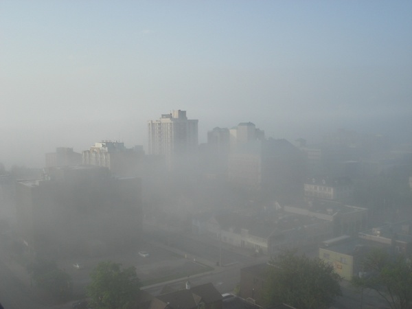 city lakeside misty morning