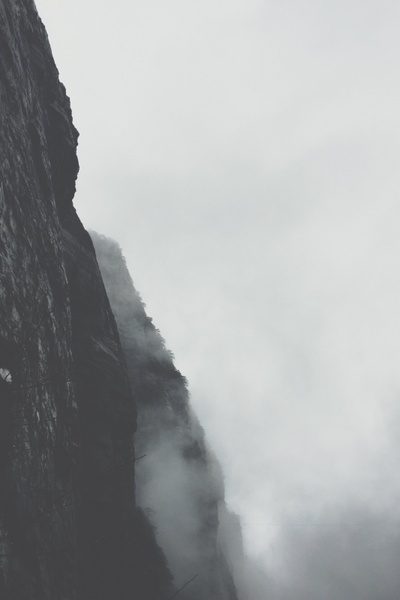 cliffs climbing daytime fog landscape mist mountain