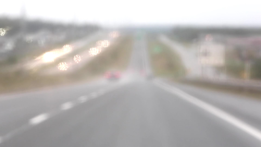 clip of car driving on highway