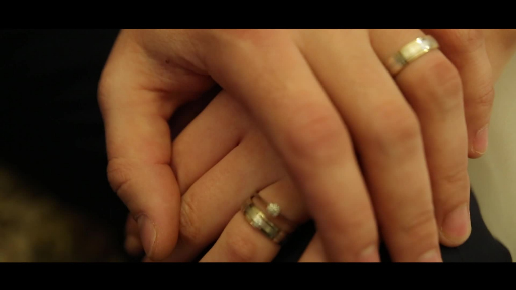 closeup of marriage couple with hand in hand