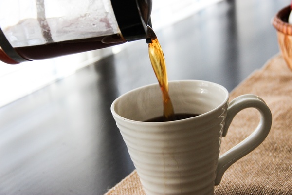 coffee pot pouring into mug