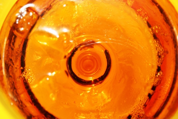 cola tonic in glass beverage with ice amber colored cool drink