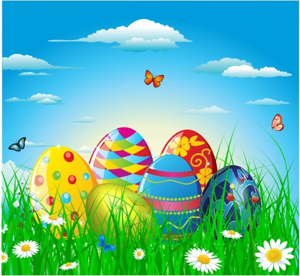 Colorful easter eggs in grass and flowers