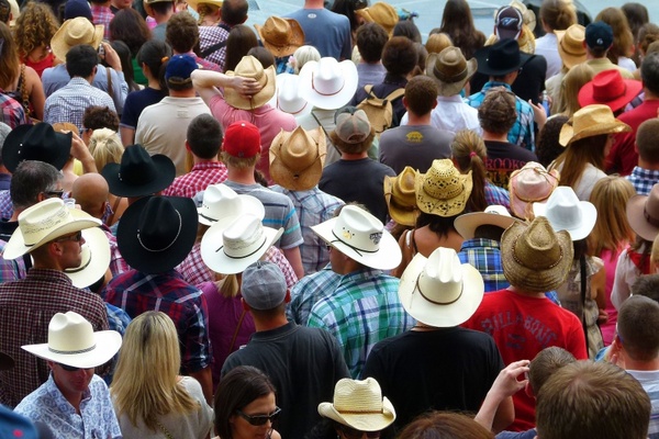 crowd heads hats