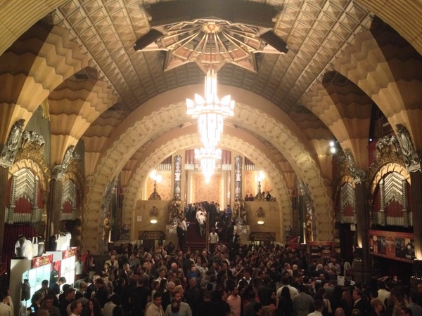 crowd of people in elaborate hall