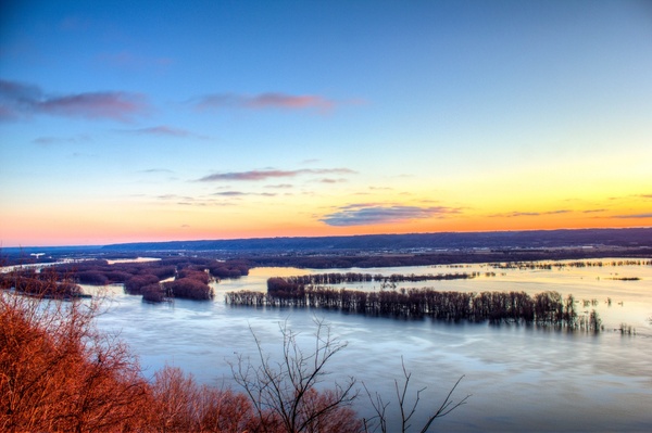 dawn on the landscape of the mississippi river at pikes peak state park iowa