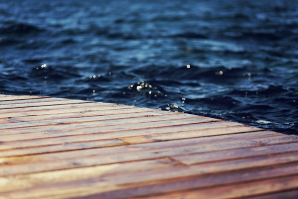 deck dock pier ripple water wave wood