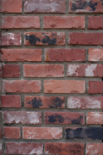 distressed red brick wall