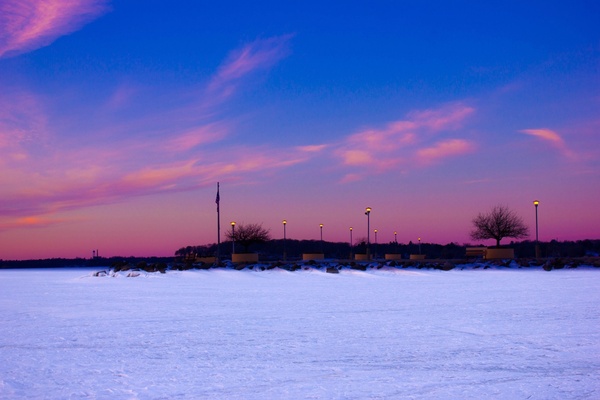 dusk over the frozen lake on lake mendota wisconsin 