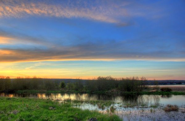 dusk skies over marshy landscape in the upper peninsula michigan