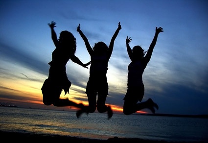 evening under the jumping silhouettes stock photo