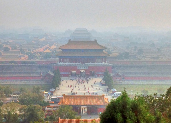 forbidden city under smog in beijing china 