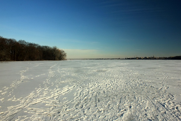 frozen lake and footprints in madison wisconsin