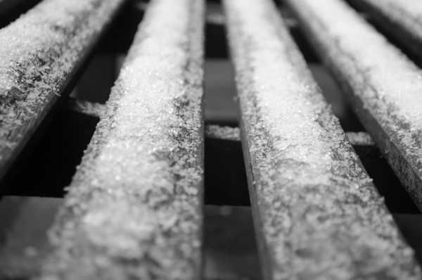 frozen snow on a bench