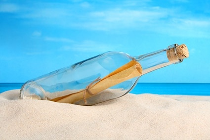 glass bottles on the beach picture 2