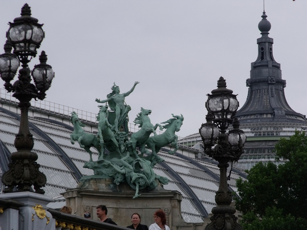 grand palais and pont alexandre iii lampposts and statue