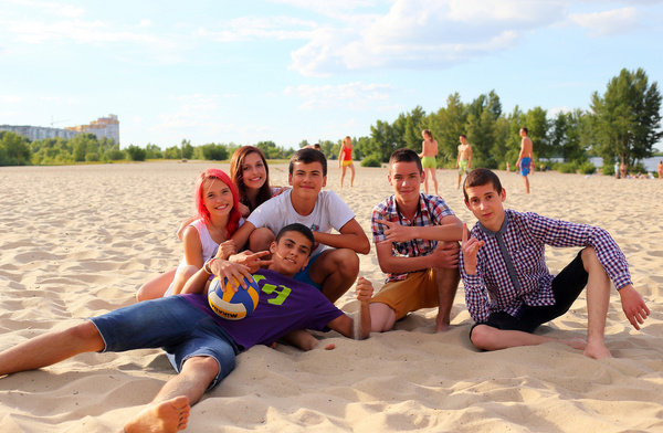 group of teens at the beach