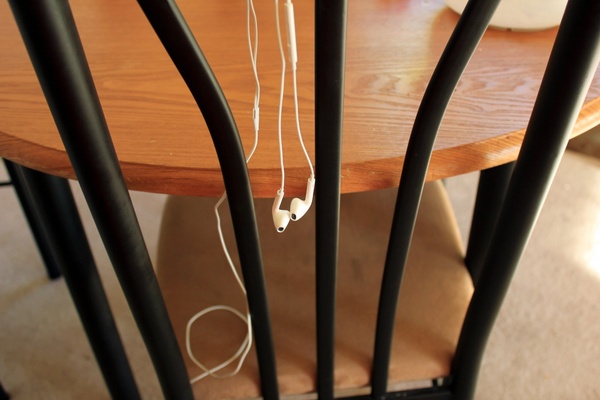 headphones hanging on a chair
