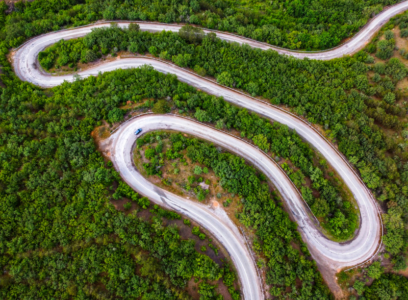 high land scenery picture curvy road forest trees high view