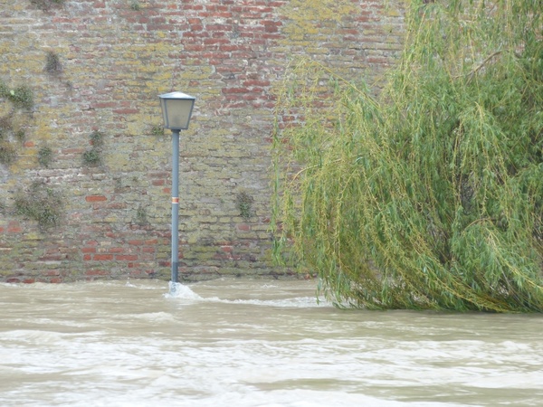 high water flooding street lamp