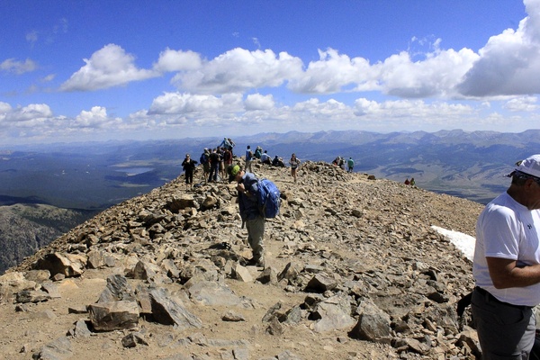 hikers at the summit at mount elbert colorado 