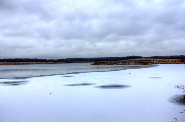 ice lake and clouds at shabbona lake state park 