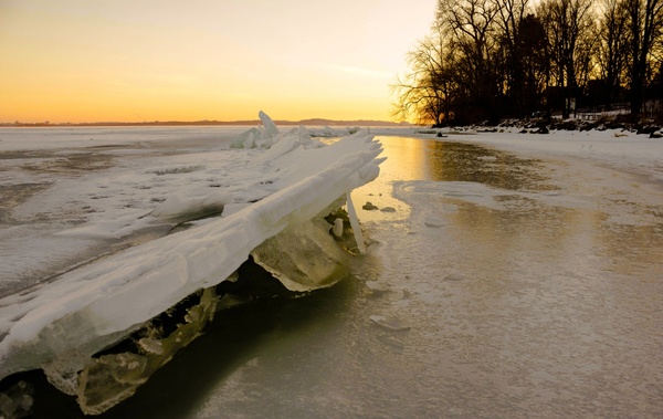 icy landscape over the lake at governor nelson state park wisconsin