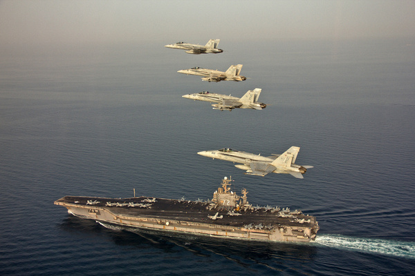 jets fly in formation above uss abraham lincoln