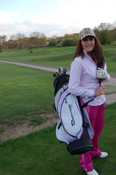 lady golfer and bag