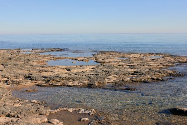 lake rocks and tide pools at whitefish dunes state park wisconsin