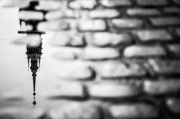 lantern on brick wall of old city