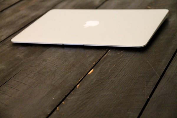 macbook air laptop on wood boards