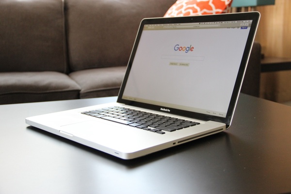 macbook laptop opened to google website