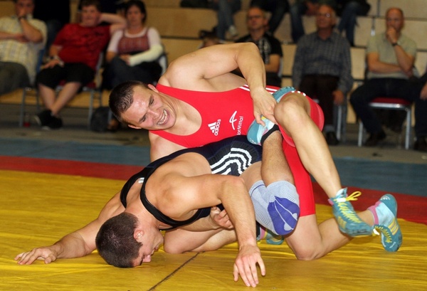 men wrestling competition