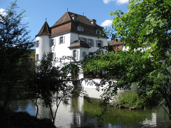 moated castle switzerland water
